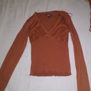 Orange long sleeve top